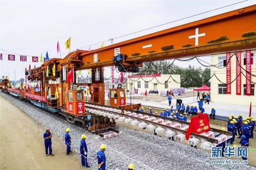 江漢平原貨運鐵路已鋪完了最后一節(jié)軌道